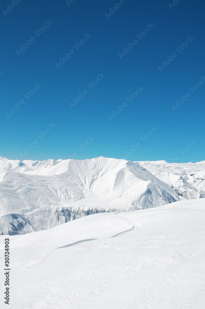 High mountains under snow in the winter High mountains under snow in the winter