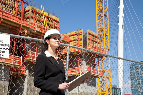 Woman working on downtown construction site