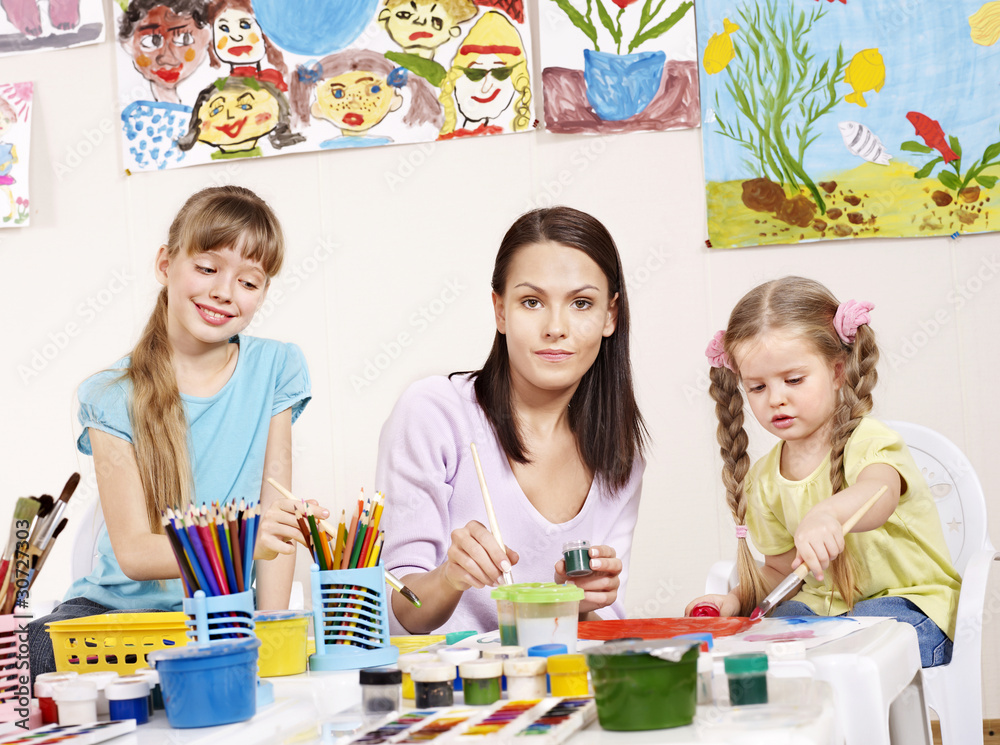 Fototapeta premium Child painting in preschool.