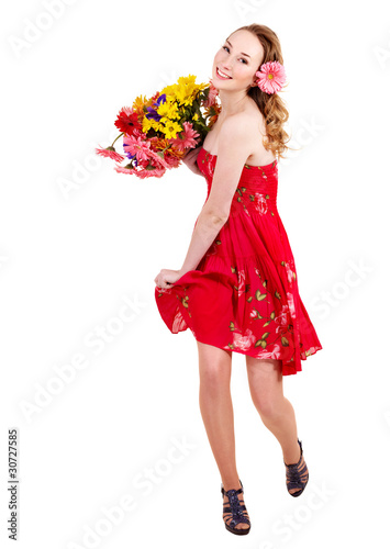 Young woman holding flowers.