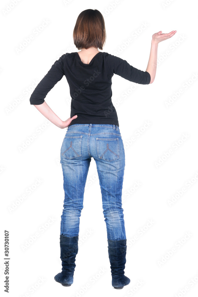 Beautiful young woman looking at wall. Isolated over white. Beautiful young woman looking at wall. Isolated over white.