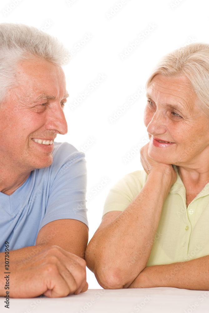 elderly couple on a white elderly couple on a white