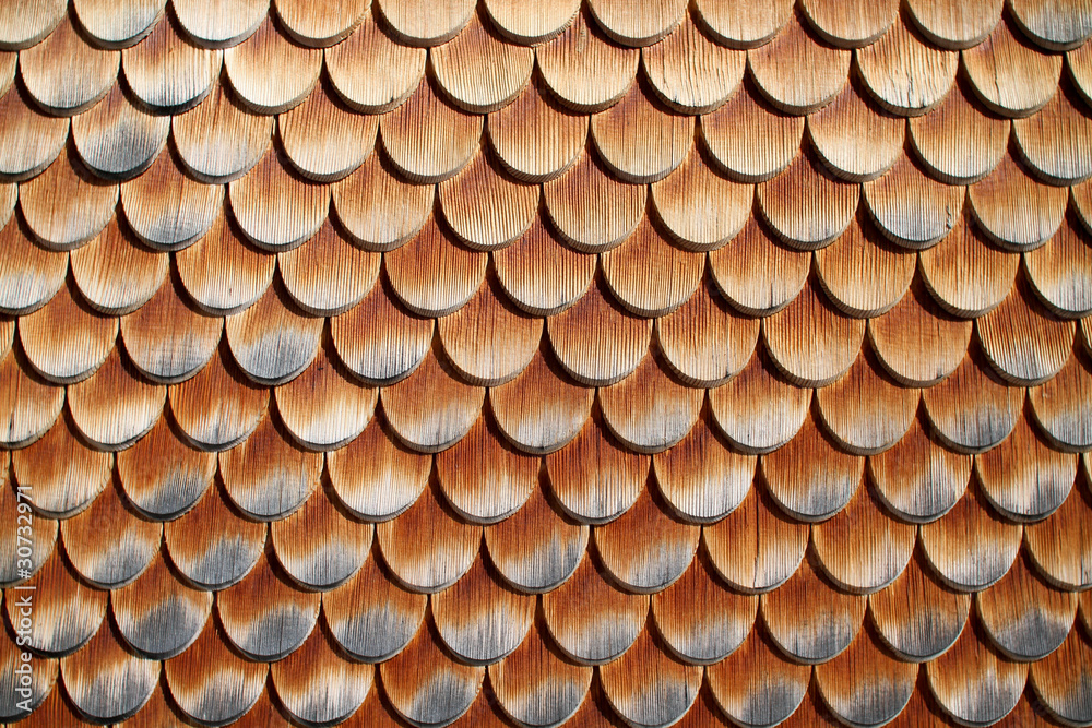 wooden tiles on house in austrian alps