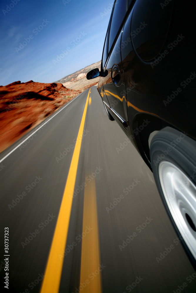 Car driving on rural road - mounted camera natural motion blur