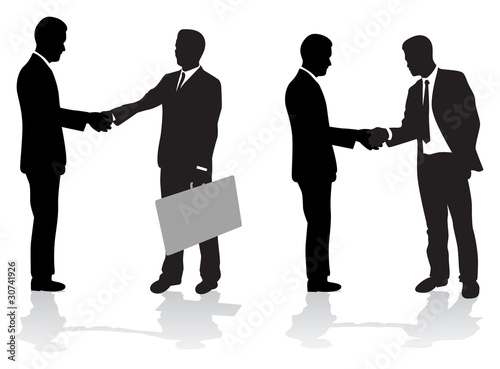 two sets of people shaking hands
