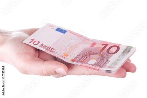 Ten Euro banknotes in female hands