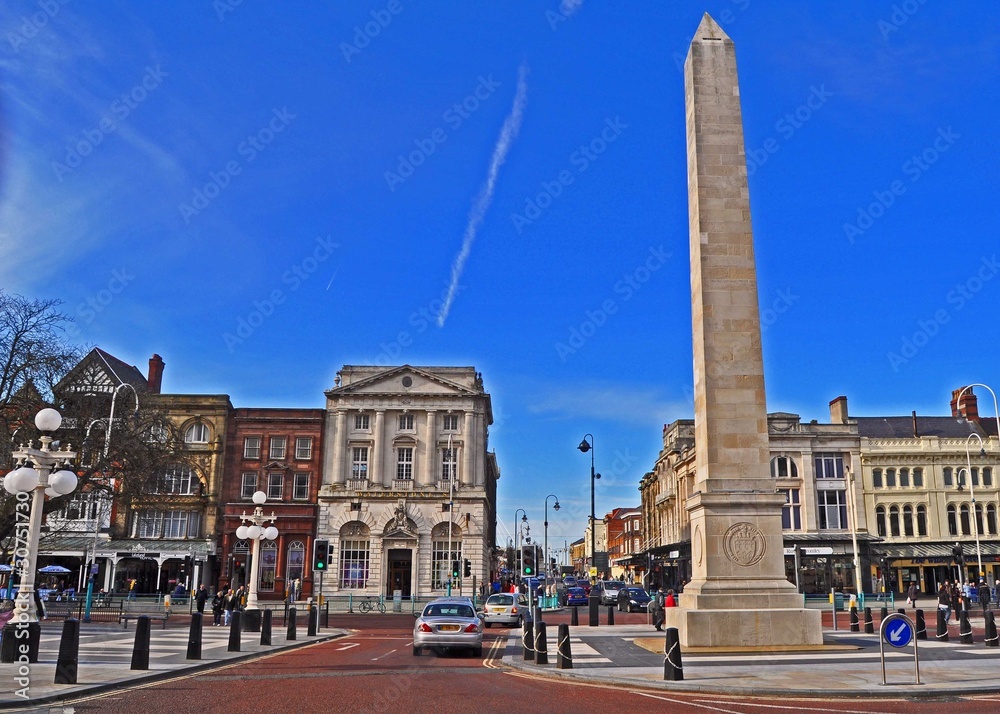 Southport Town Centre showing the iconic obelisk against a blue Summer sky in Merseyside Uk 