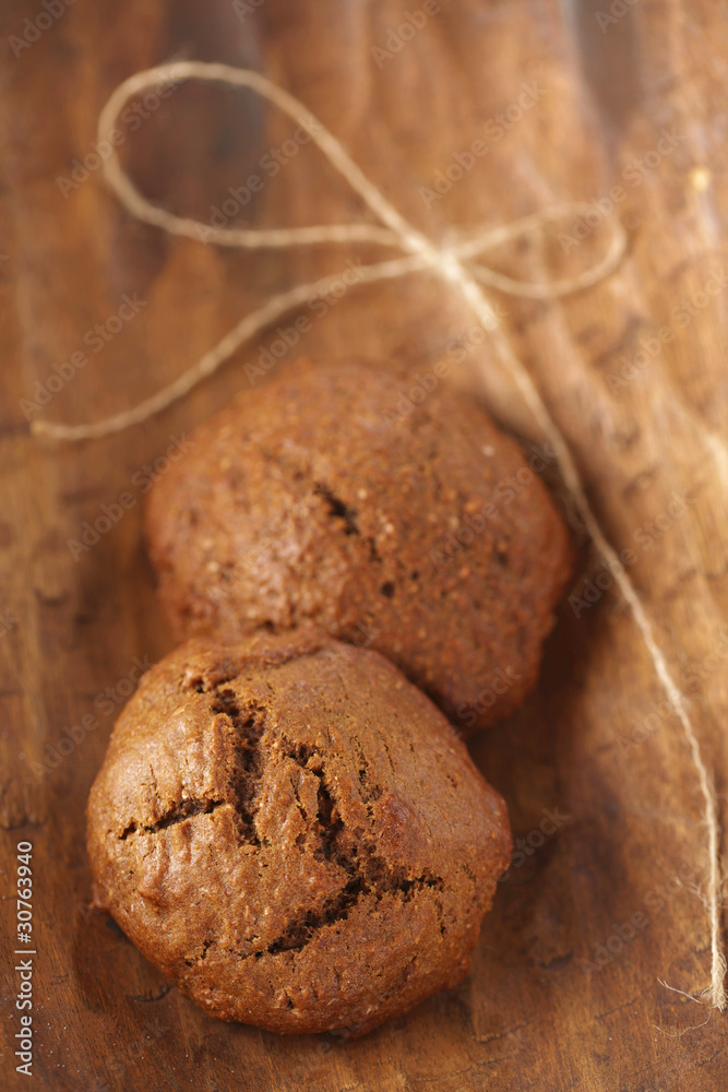 Fototapeta premium soft ginger cookies on wood, shallow dof