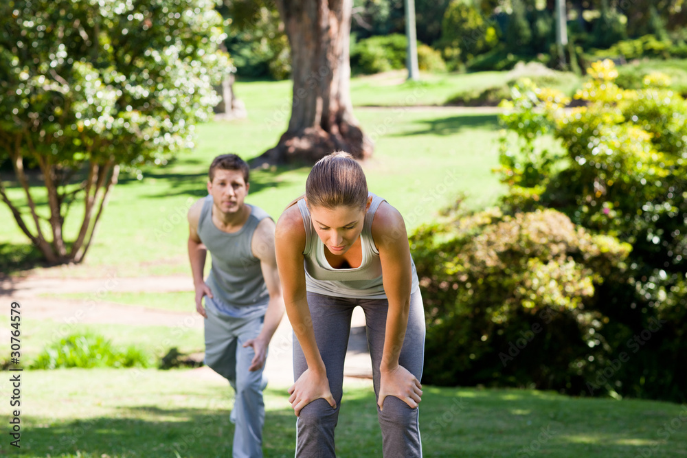 Fototapeta premium Sporty lovers in the park
