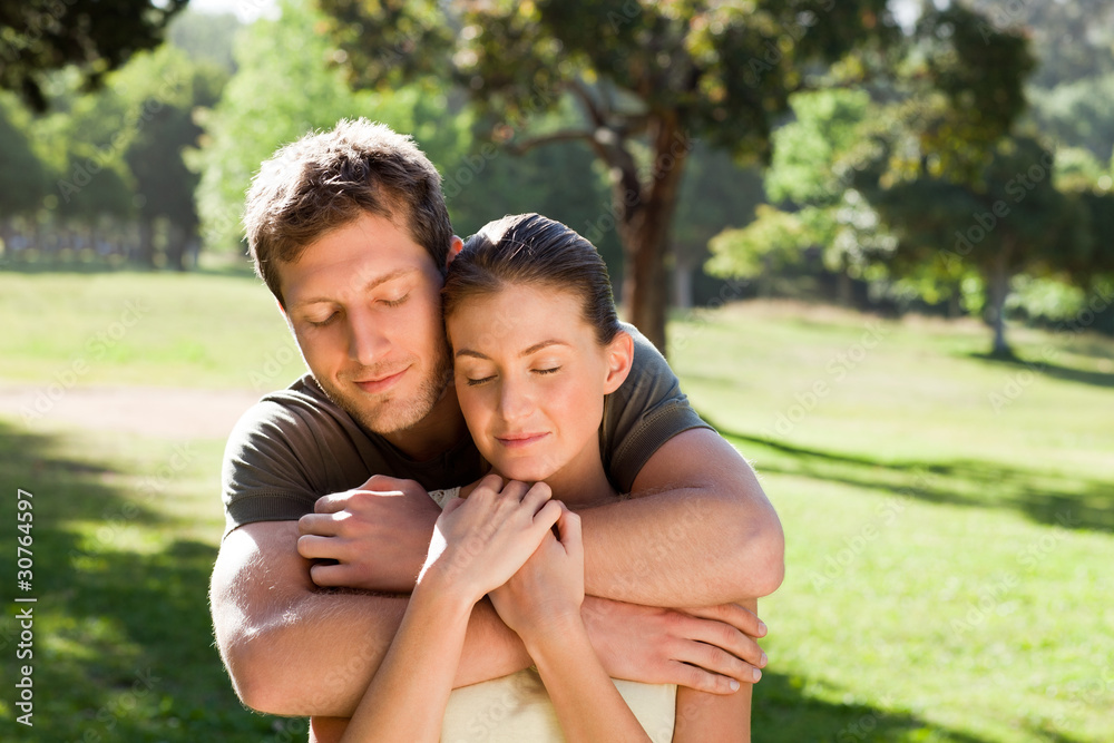 Man hugging his beautiful wife Man hugging his beautiful wife