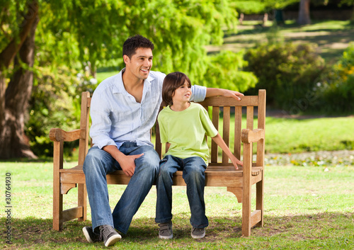 Father with his son on the bench