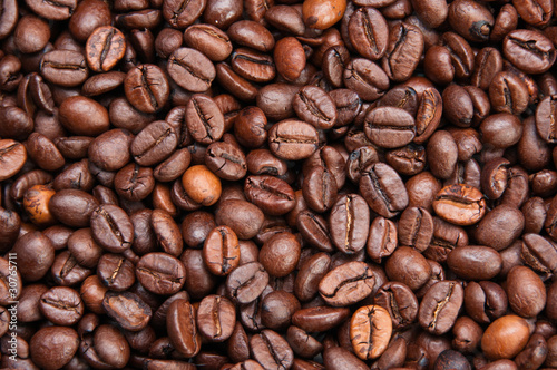 Dark roasted coffee beans texture © KorwelPhoto