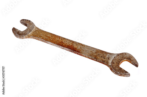 Old rusty wrench, isolated on white background