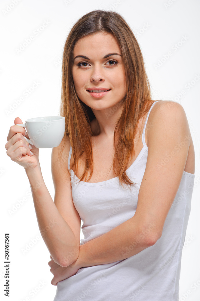 Young happy mixed race woman holding a coffee cup isolated on wh Young happy mixed race woman holding a coffee cup isolated on wh