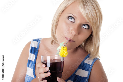 Pretty blonde girl sipping fresh juice