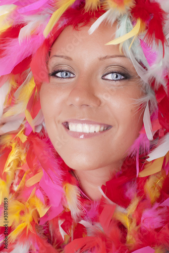 Portrait of the beautiful young girl in a boa. photo