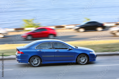 Blue car on road