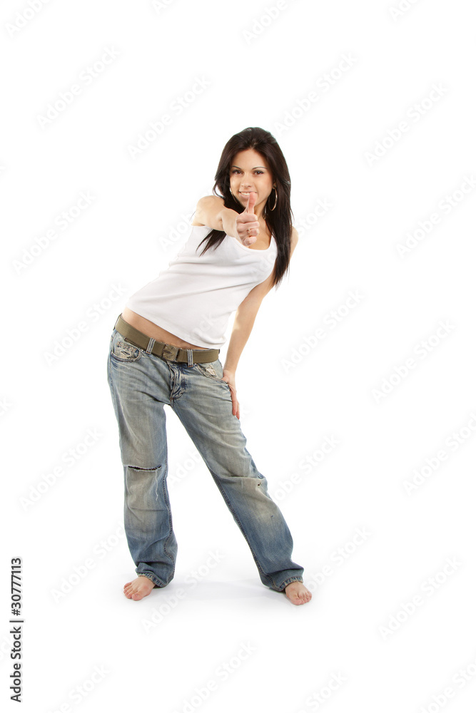 Portrait of an excited young woman gesturing a thumbs up sign Portrait of an excited young woman gesturing a thumbs up sign