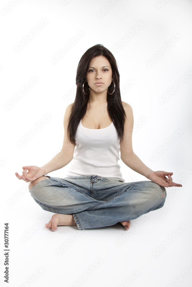 brunette girl siting in yoga pose on white background brunette girl siting in yoga pose on white background