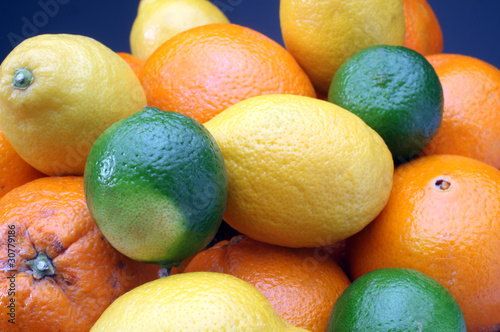 Citruses: lime, lemon and orange photo