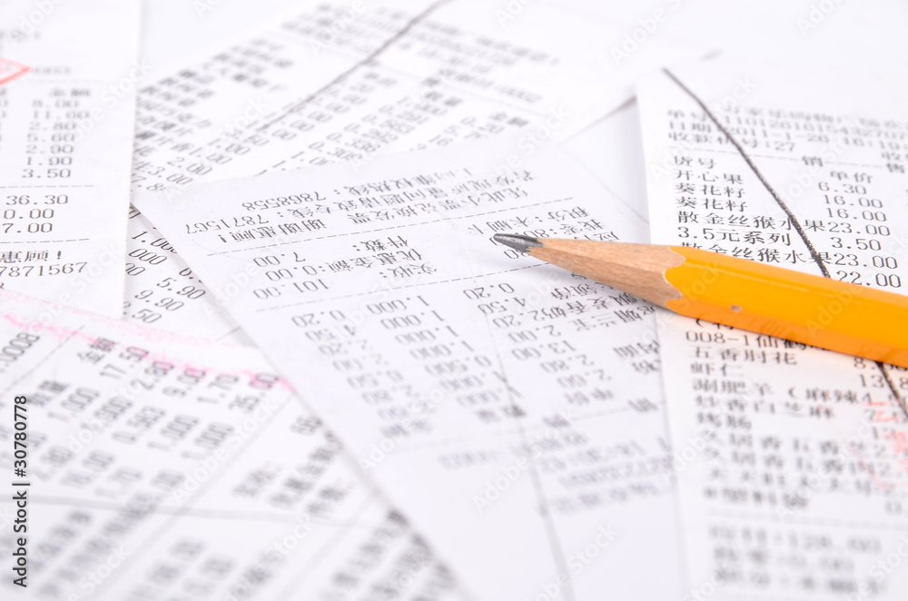 Obraz premium Pencil and receipt