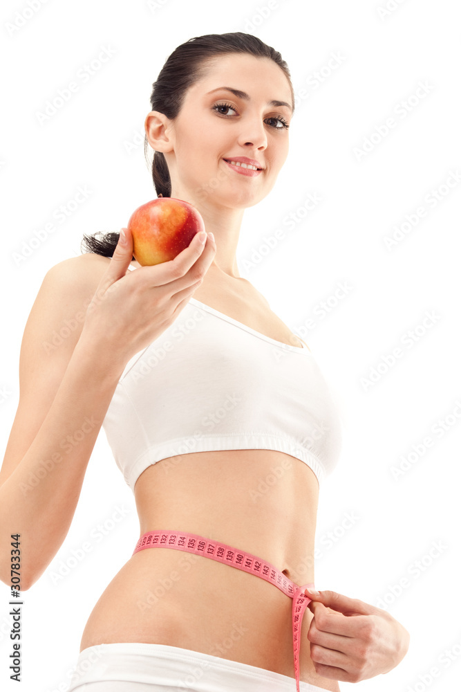 woman with apple and measure tape woman with apple and measure tape