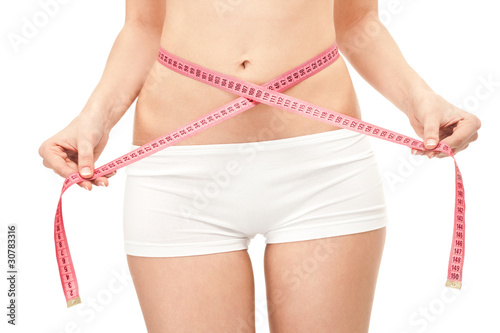 woman measuring part of body