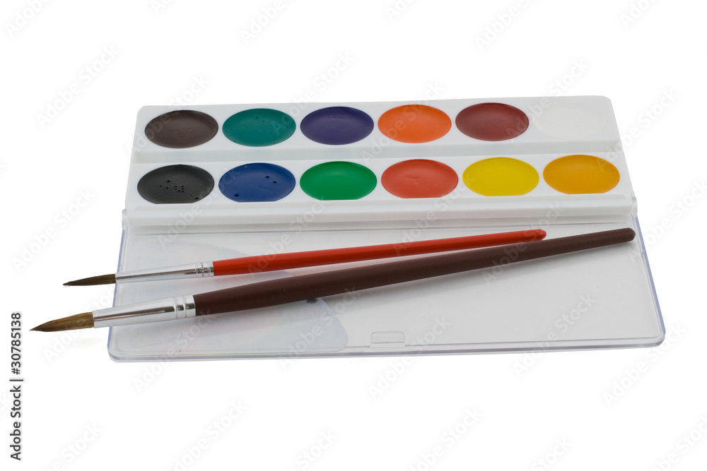 Naklejka premium Children's watercolors in a box with brushes to paint