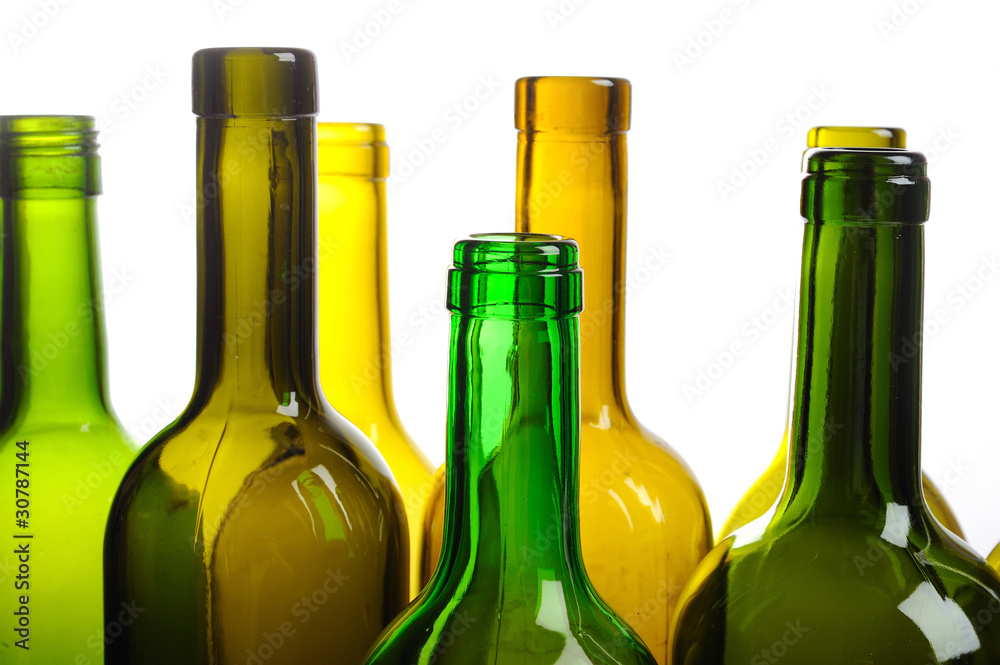 Many empty green wine bottles isolated on white background Many empty green wine bottles isolated on white background