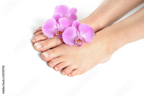 Beautiful feet with perfect spa french nail pedicure.isolated © Dmitrijs Gerciks
