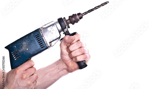 Handwerker mit Bohrmaschine, freigestellt
