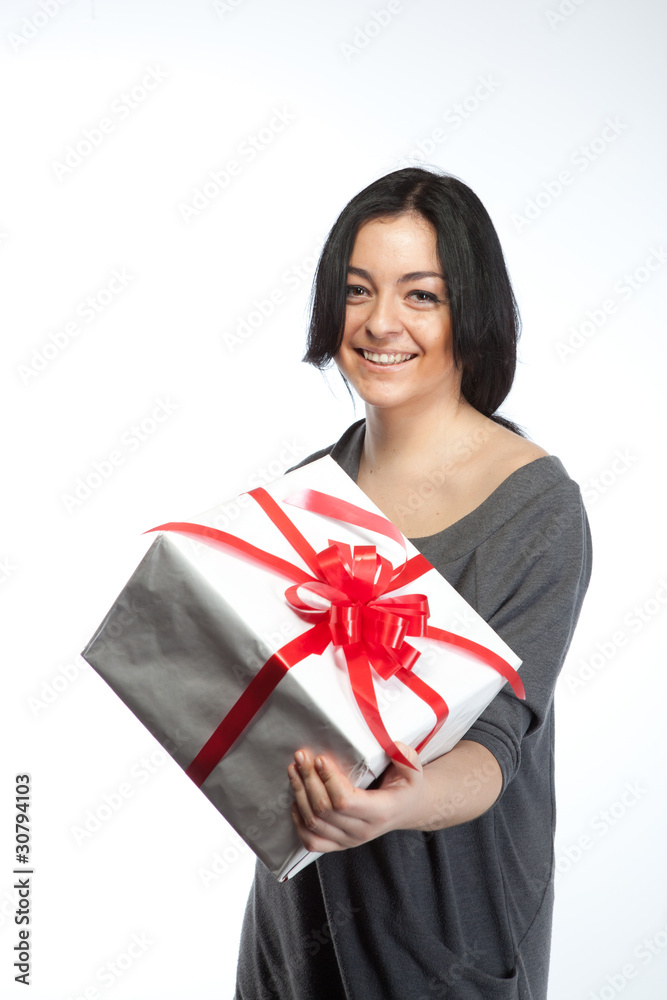 Portrait of young smiling woman with gift on white Portrait of young smiling woman with gift on white
