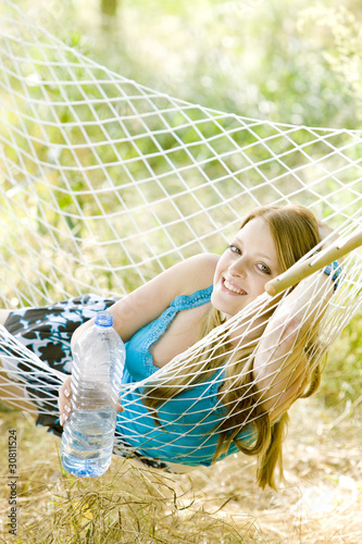 woman resting in hammock