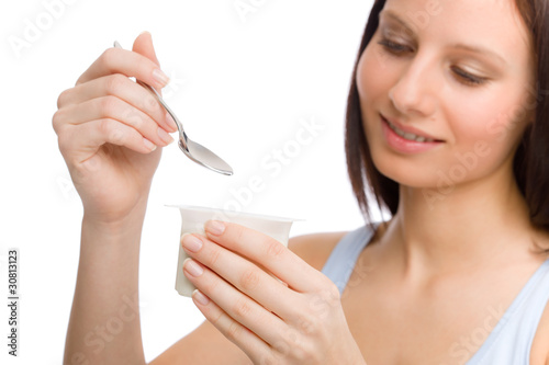 Healthy lifestyle -  woman eat yogurt