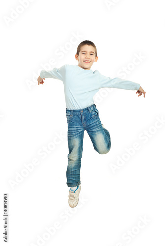 Jumping happy kid boy