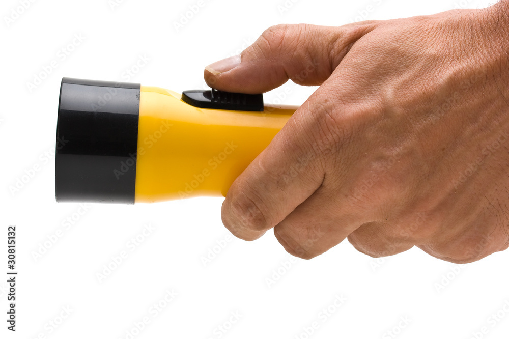 yellow flashlight in hand yellow flashlight in hand
