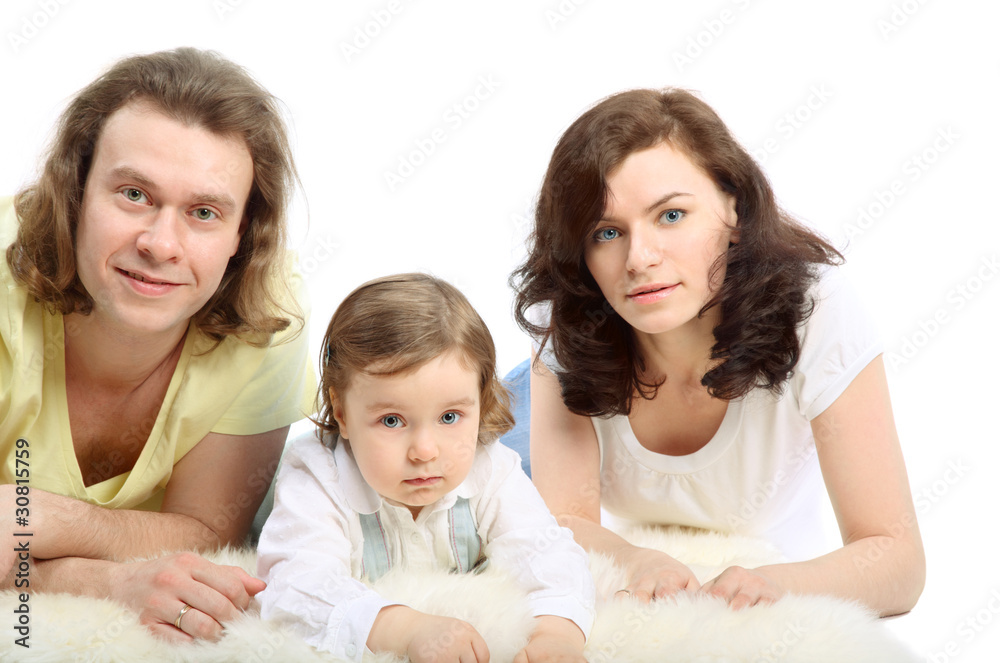Happy young family - mother, father and little daughter Happy young family - mother, father and little daughter