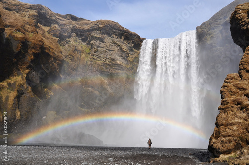 Skogafoss waterfall with rainbow south Iceland