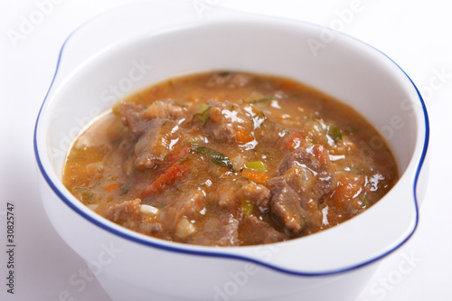 Meat stew with vegetables and herbs