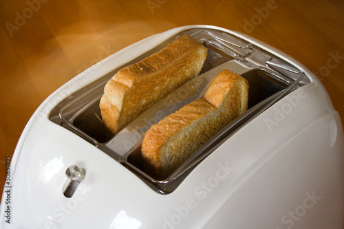 Toaster with two hot toasts.