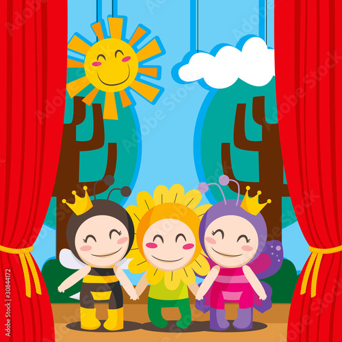 Babies on costumes performing on cute theater stage