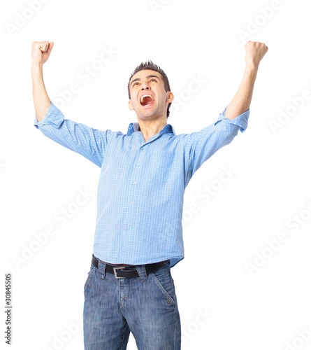 Portrait of a very happy young man with his arms raised