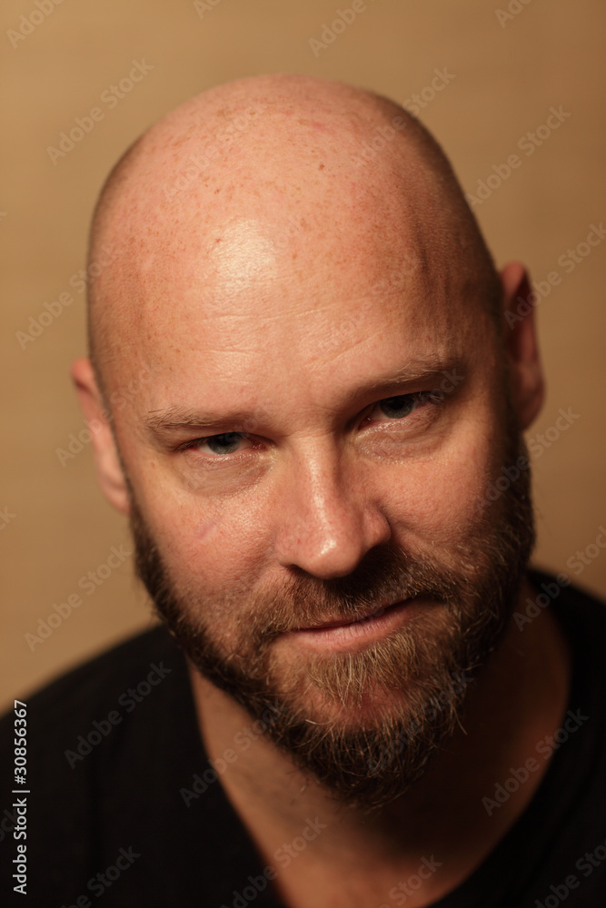 Fototapeta premium Handsome bald man with a beard