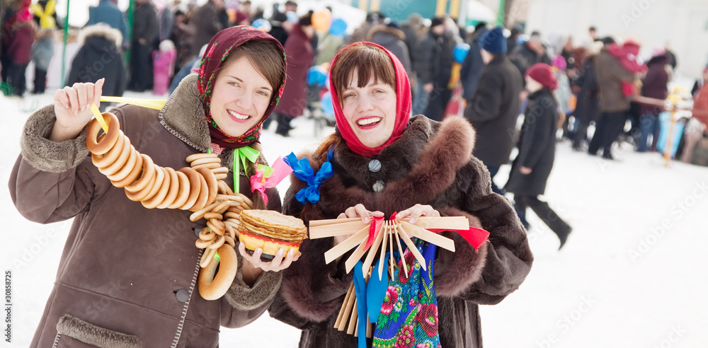 girls plays during Shrovetide at Russia