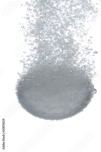 Effervescent tablet falling in water