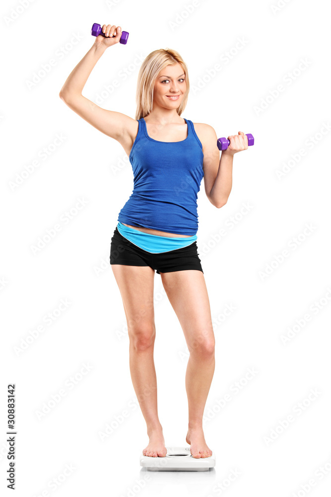 Full length portrait of a female standing on a weight scale and Full length portrait of a female standing on a weight scale and