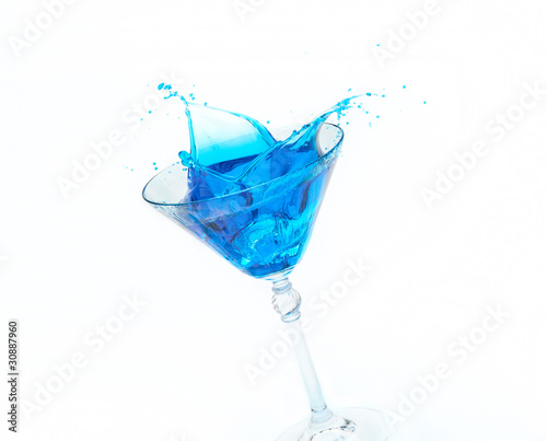 Blue splash in a glass
