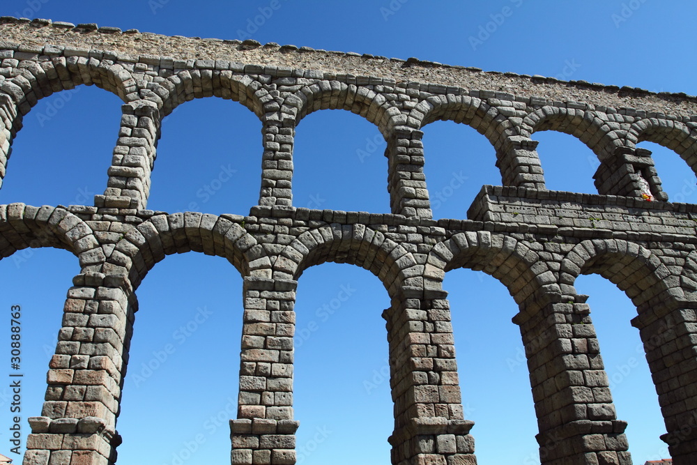 The famous Roman Aqueduct in Segovia in Spain. The famous Roman Aqueduct in Segovia in Spain.