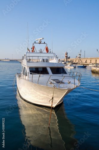 Boat moored at Monopoli port. Apulia.