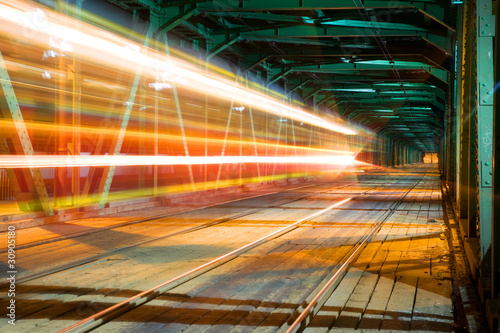 Train speeding on the bridge in Warsaw